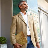 A business man carrying personalized microsoft surface case with Science design in the park