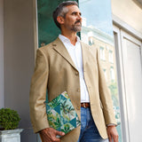 A business man carrying personalized microsoft surface case with Tropical Leaves design in the park